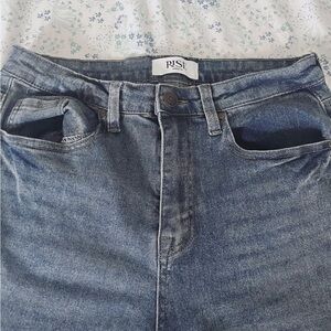 woman’s blue bootcut jeans